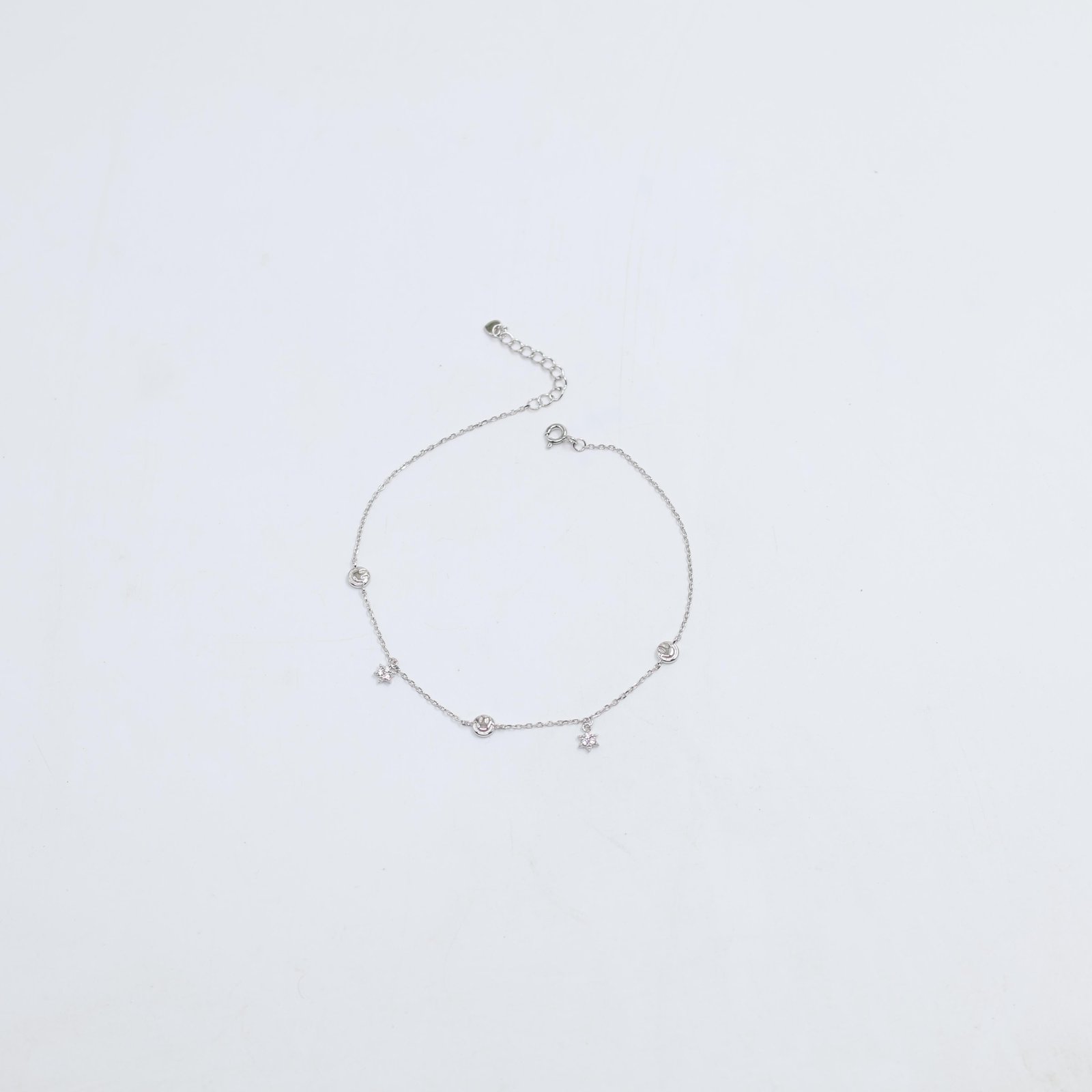 Silver Smiley Face and Star Charm Bracelet